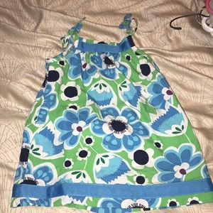 Green dress with blue flowers and bow straps